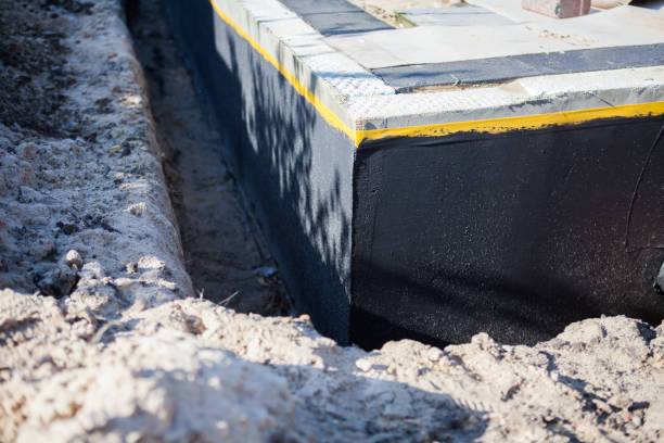 Professional Interior Drainage System technician working in Voorhees, NJ